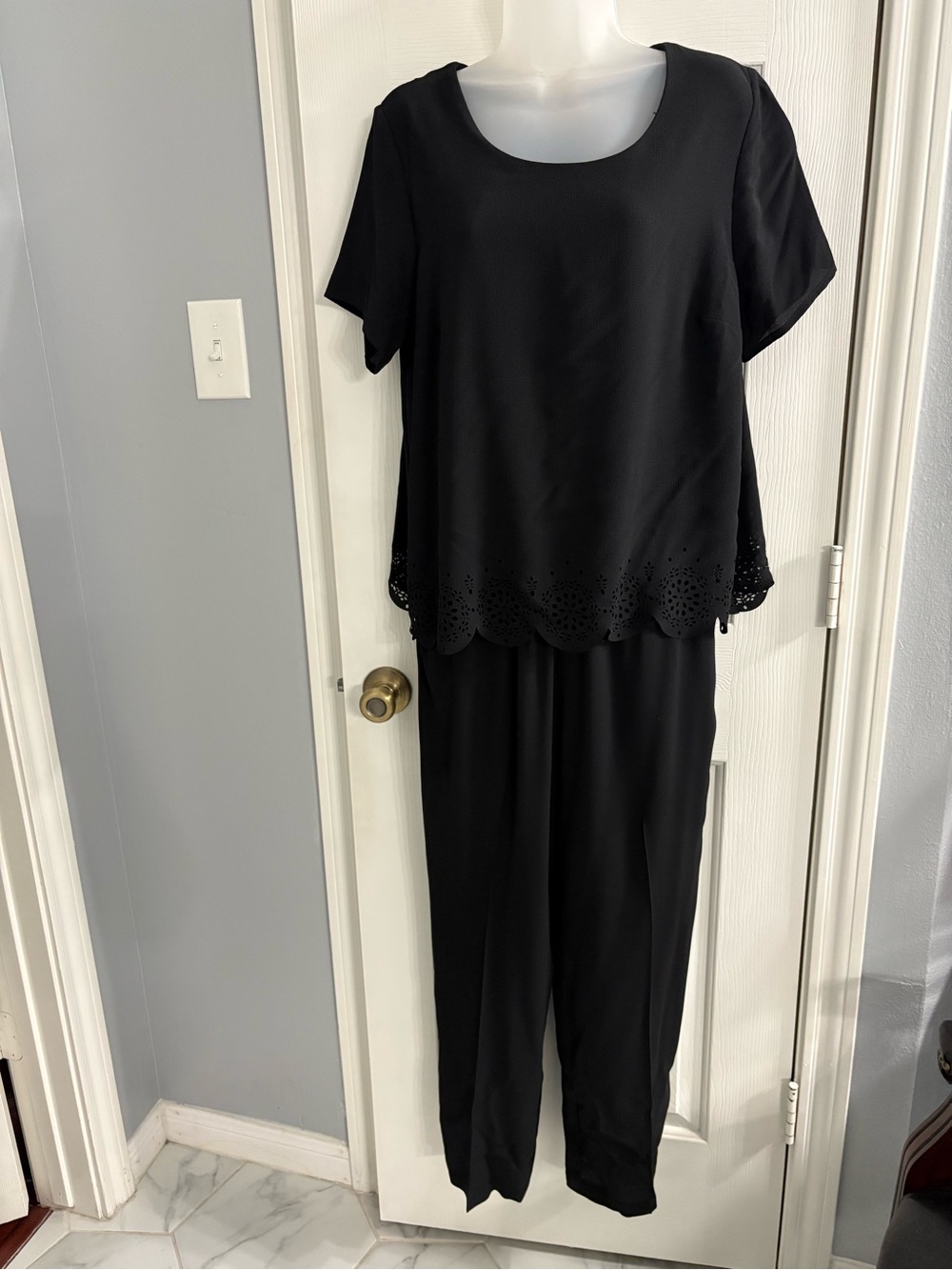 NY Collection Black Short-Sleeve Jumpsuit with Laser-Cut Hem Detail